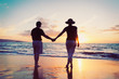 © EpicStockMedia - Senior Couple Enjoying Sunset at the Beach