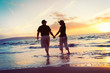 © EpicStockMedia - Senior Couple Enjoying Sunset at the Beach
