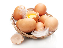 Chicken Eggs In A Nest Isolated On White