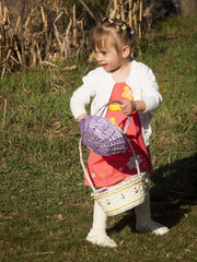 Wall Mural - Toddler on Easter Egg Hunt