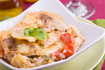 Rice, potatoes and mussels. Tiella di riso, patate e cozze.