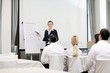 © .shock - business woman giving presentation