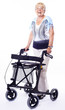 happy senior lady with walker for disabled people