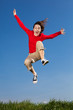© Jacek Chabraszewski - Girl jumping, running against blue sky