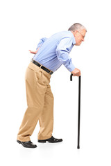 Sticker - Full length portrait of a senior man walking with cane