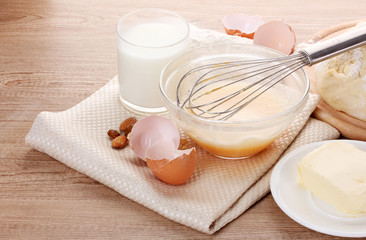 Canvas Print - Ingredients for the dough wooden table