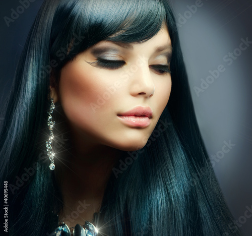 Naklejka na meble Beautiful Brunette Girl. Healthy Long Hair and Holiday Makeup