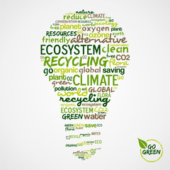 Wall Mural - Go Green. Words cloud about environmental conservation in bulb