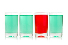 Glasses With Green And Red Liquid