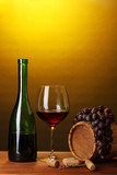Fototapeta  - In wine cellar. Composition of wine bottle and runlet