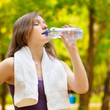 © mr.markin - Woman drinking water after fitness exercise