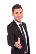 © Viorel Sima - Business man offering a handshake