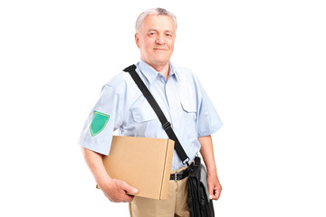 Poster - A mature postman delivering a box