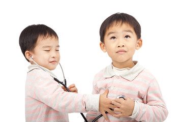 two boys using stethoscope Check the heartbeat