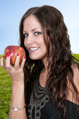 Woman Eating an Apple