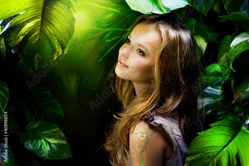 Fototapeta na wymiar Beautiful Girl in Jungle