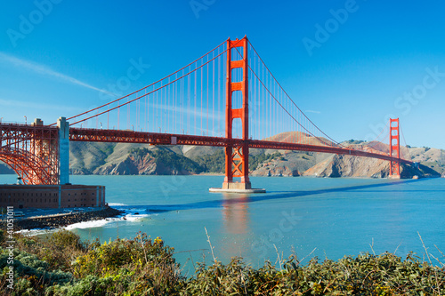 The Golden Gate Bridge in San Francisco with beautiful blue ocea Poster