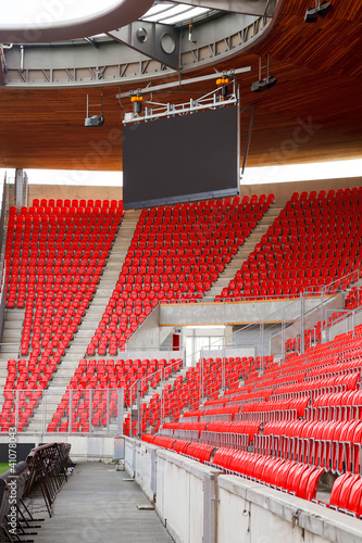 Naklejka na meble Corner of an empty football stadium with projection screen