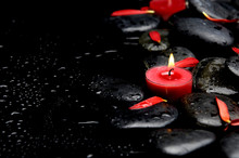 Spa Concept- Spa Stones And Red Flower Petals With Red Candle