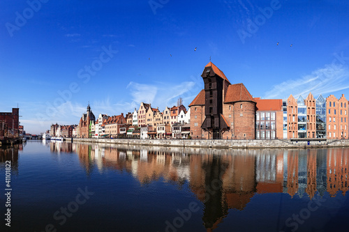 Fototapeta na wymiar The riverside with the characteristic crane of Gdansk, Poland.