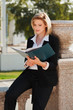 Young businesswoman with a folder