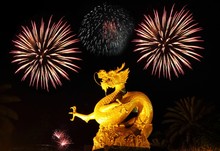 Golden Gragon Statue With Fireworks, Phuket Thailand