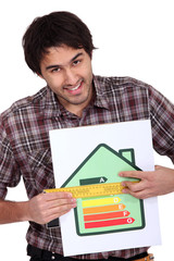 man holding abcd image house