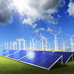 Wall Mural - powerplant with photovoltaic panels and eolic turbine on blue sk