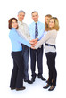 © yurolaitsalbert - Smiling business people holding hands together in a