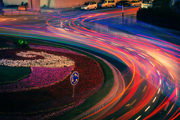 moving car with blur light through city at night