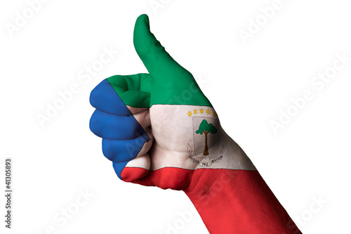 Fotografía equatorial guinea national flag thumb up gesture for excellence