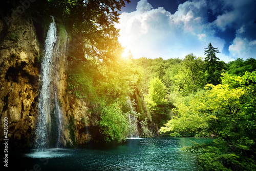 Naklejka dekoracyjna waterfall in deep forest