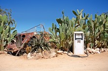 Old Gas Station With Wreck Of Car