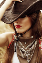 Beautiful Cowgirl. Shot In The Stable