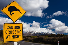 Kiwi Crossing Road Sign And Volcano Ruapehu, NZ
