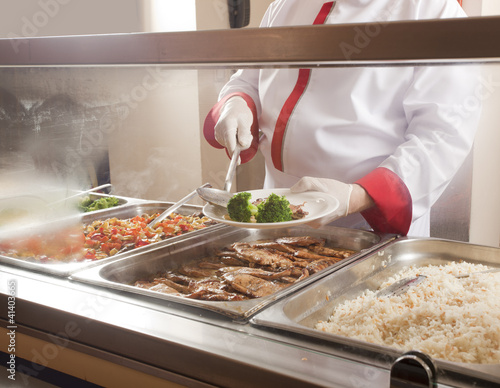 Fotografie, Obraz chef standing behind full lunch service station