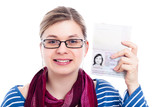 Fototapeta Młodzieżowe - Happy tourist traveller woman with passport