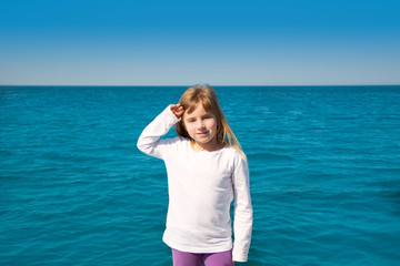 Canvas Print - blond little kid girl sailing in a boat