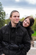 © M-Production - Portrait of happy couple in park.