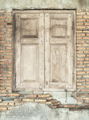 Wall Mural - Old wooden windows on brick wall