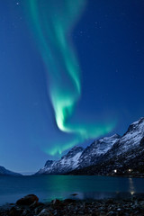Wall Mural - aurora borealis in norway, reflected