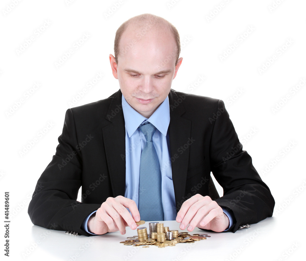 Businessman put coins isolated on white