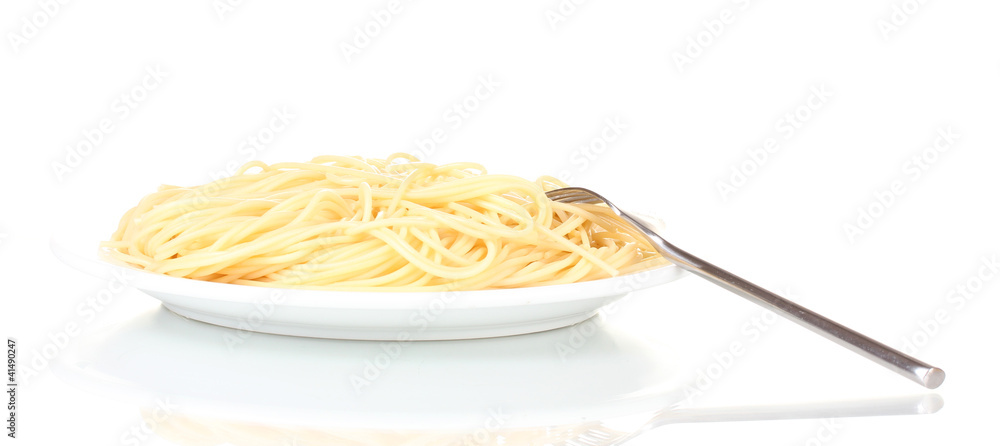 Italian spagetti cooked in a white plate with fork isolated