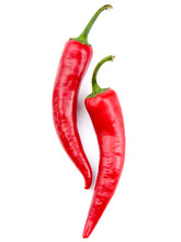 Two Red Chili Peppers Isolated On The White