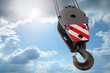 © Kuzmaphoto - Crane hook on a blue sky