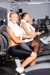 © michaeljung - group of girls on gym bike