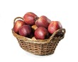 basket of red apples on white background