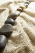line of stones on towel