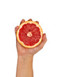© schankz - Half of grapefruit in female hand. Isolation.