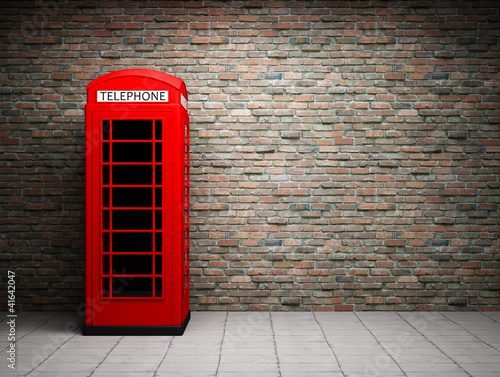 Fototapeta na wymiar Classic red telephone booth